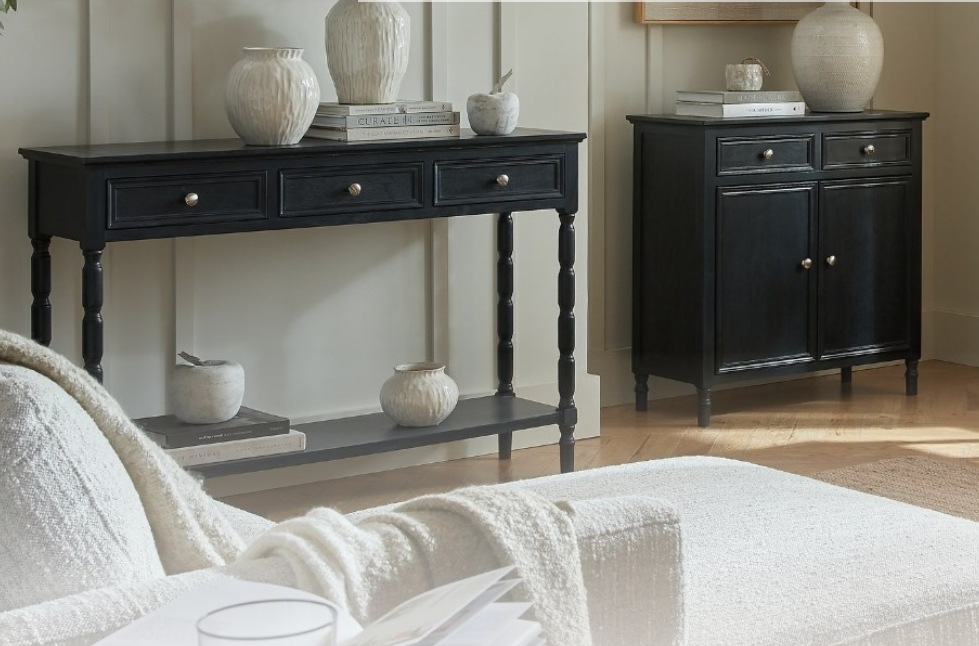  Hand-painted Contour Collection furniture set including a chest of drawers and bedside table in a styled bedroom.