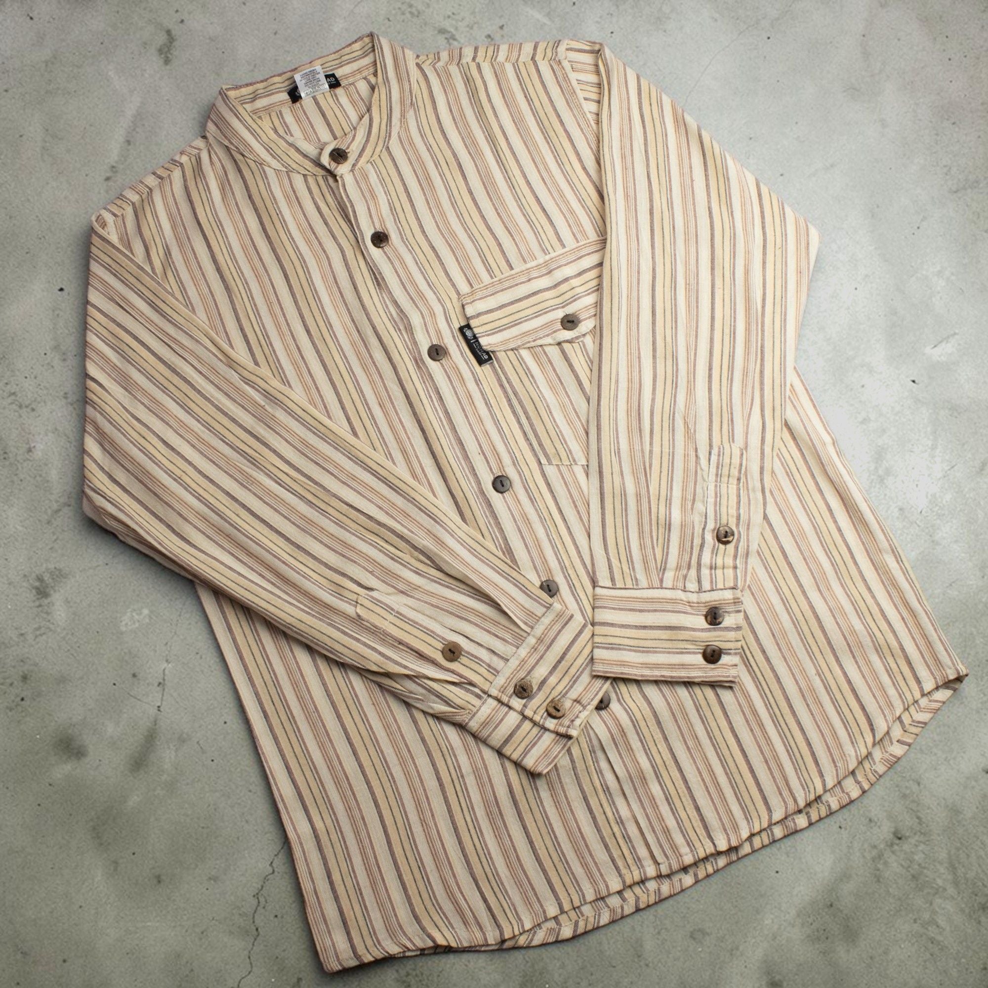 Front view of the Brown and Beige striped Nomad Sari Grandad shirt with a collarless neckline.