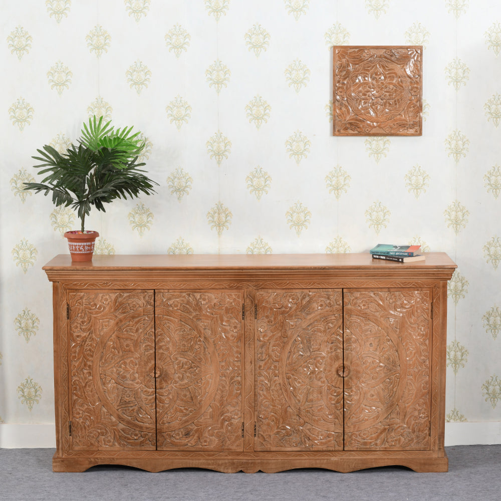 Extra-large Artwork solid mango wood sideboard featuring 4 hand-carved doors and a distressed whitewash finish.
